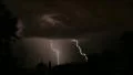 Powerful lighting storm approaches Vidéos HD