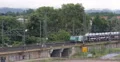 Powerful Locomotive Pulling Cars Automobiles Auto Vehicles Cargo Train Passing 4k or 4k+ Resolution