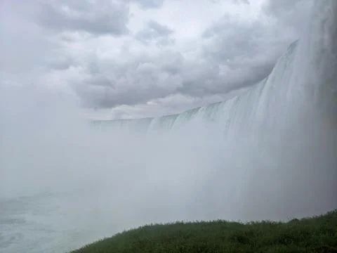 A powerful low angle view from the bottom of Niagara Falls Stock Photos