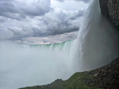 A powerful low angle view from the bottom of Niagara Falls Stock Photos
