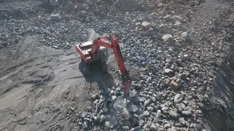 Powerful machinery in the granite quarry Stock Footage 200826312