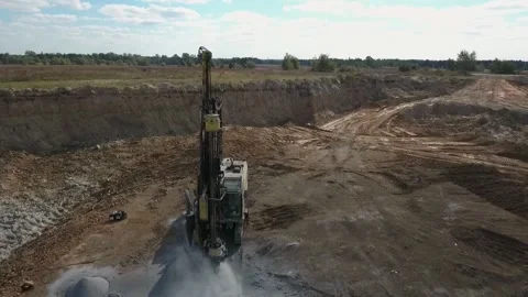 Powerful machinery in the granite quarry Stock Footage 200826381