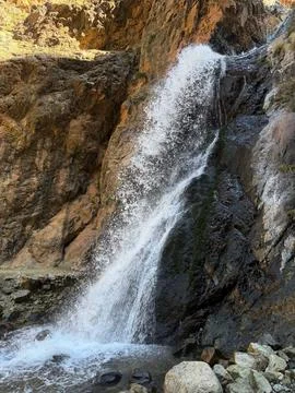 Powerful Mountain Stream Falling over Rugged Stone Formations in Atlas Mountains Stock Photos