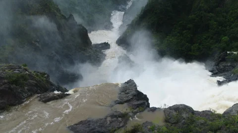 Powerful muddy river flowing through rocky canyon Stock-Footage 333137425
