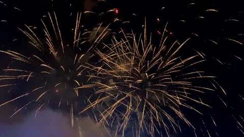 Powerful multi-colored fireworks against the background of a dark sky Stock Footage 258543754