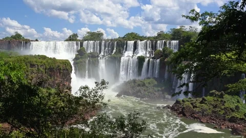 Powerful multi-tiered cascades of the Iguazu Falls in South America Stockbeeldmateriaal 343440338