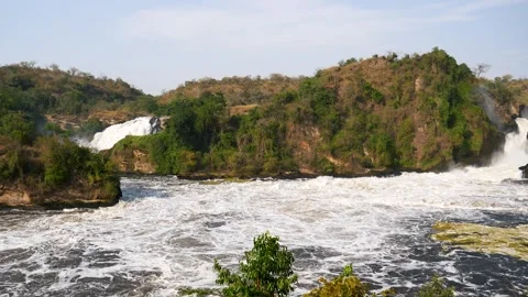 Powerful murchison falls flowing into victoria nile river in uganda Stockbeeldmateriaal 343675549