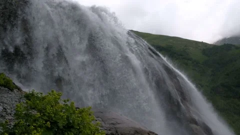 Powerful noisy Alibek waterfall in the mountains of the North Caucasus, Dombai Stock Footage 144041565