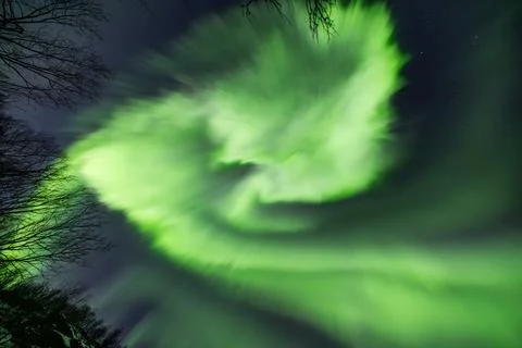 Powerful northern lights explode across the sky during an auroral substorm Stock Photos
