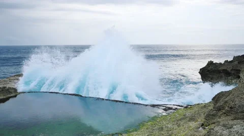 Powerful ocean splash at Devil's Tears, Nusa Lembongan, Bali. Stock Footage 68840835