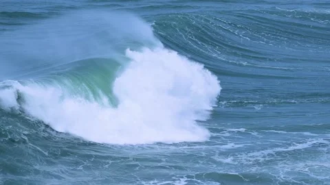 Powerful Ocean Wave Curling in Vibrant Blue Waters Stock Footage 297511652