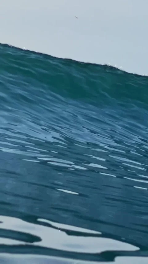 Powerful ocean wave. View from the water.Vertical video Stock Footage 311934644