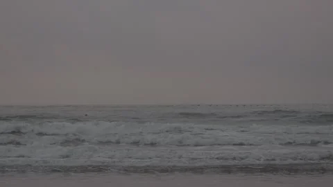 Powerful Ocean Waves Breaking on Beach - Grey Sky Stock Footage 336797219