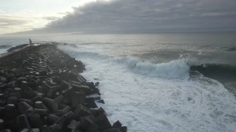 Powerful Ocean Waves Crashing on The Pier Rocks  Stock Footage 167945944