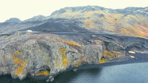 Powerful ocean waves crashing on the rocks in the western part of Iceland in the Stock Footage 119998565