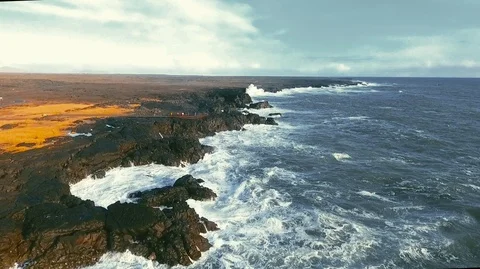 Powerful ocean waves crashing on the rocks in the western part of Iceland in the Stock Footage 120000704