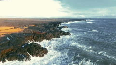 Powerful ocean waves crashing on the rocks in the western part of Iceland in the Stock Footage 120000742