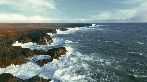 Powerful ocean waves crashing on the rocks in the western part of Iceland in the Stock Footage 120000829