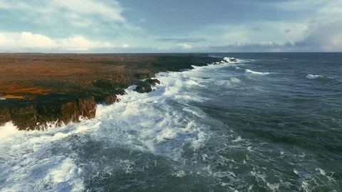 Powerful ocean waves crashing on the rocks in the western part of Iceland in the Stock Footage 120000856