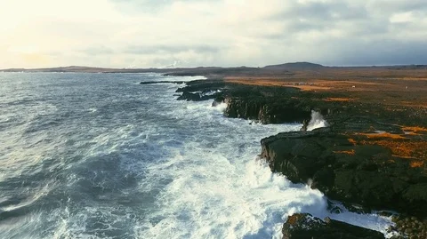 Powerful ocean waves crashing on the rocks in the western part of Iceland in the Stock Footage 120000874