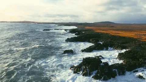 Powerful ocean waves crashing on the rocks in the western part of Iceland in the Stock Footage 120000930