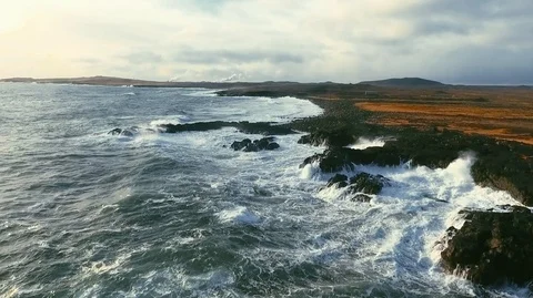 Powerful ocean waves crashing on the rocks in the western part of Iceland in the Stock Footage 120000971