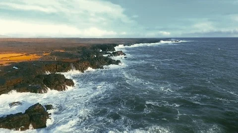 Powerful ocean waves crashing on the rocks in the western part of Iceland in the Stock Footage 120000992