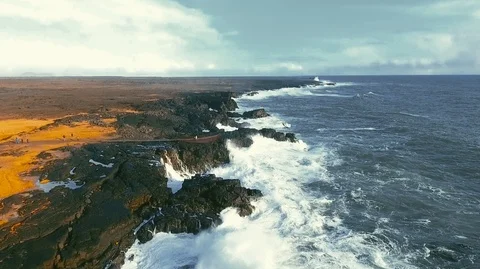 Powerful ocean waves crashing on the rocks in the western part of Iceland in the Stock Footage 120001192