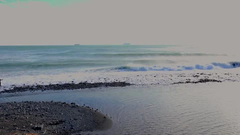 Powerful Ocean Waves Crashing on a Rocky Shoreline in High Keys - C0003 Stock Footage 293373191
