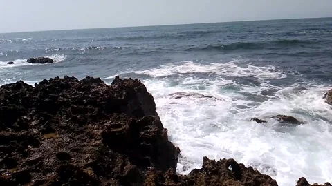 Powerful Ocean Waves Crashing with White Foam Against Rocky Shore Stock Footage 342612628
