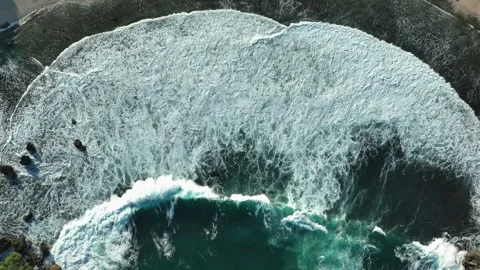 Powerful Ocean Waves Creating Foam Patterns from Above Stock Footage 340120599