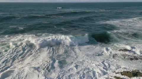 Powerful Ocean Waves Hitting The Rocky Coastline Of A Coruña, Spain. - aerial Stockbeeldmateriaal 253487190