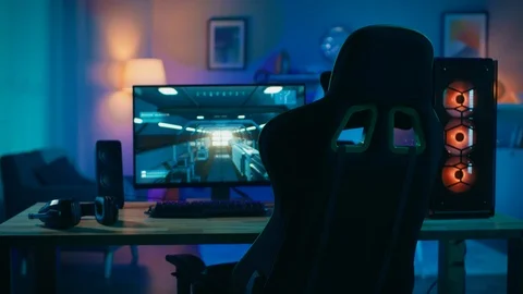 Powerful Personal Computer Gamer Rig with First-Person Shooter Game Paused on PC Stock Footage 99656058