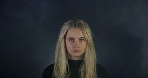 Powerful Pretty Young Blonde Model Staring at the Camera With Blue Eyes. Stock Footage 109202453