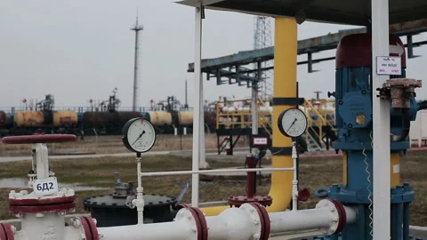 Powerful production area or facility with valves. Transportation of fuel by trai Stock Footage 199487503