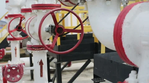 Powerful production area or facility with pipes and valves. Distiller of crude. Stock Footage 199487517