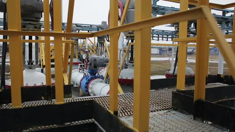 Powerful production area or facility with counters and valves. Distiller of crud Video stock 199487525