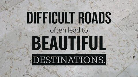 A powerful quote, DIFFICULT ROADS often lead to BEAUTIFUL DESTINATIONS, is .. Stock Photos