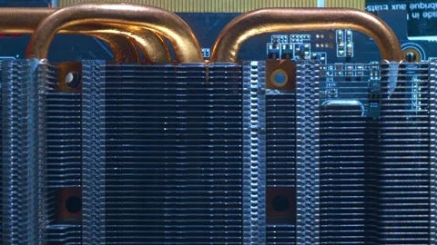 Powerful radiator with copper tubes for cooling the computer video card Stock Footage 268892617