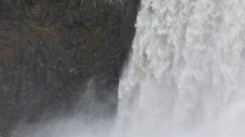 Powerful raging whitewater waterfall falling forcefully over a rocky Vídeos de archivo 96252194