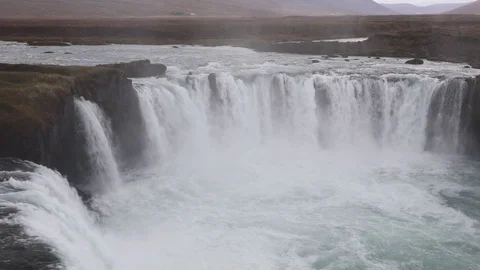 Powerful raging whitewater waterfall falling forcefully over a rocky 動画素材 96253042