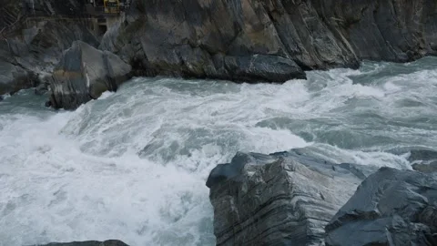Powerful Rapids Crashing Through Tiger Leaping Gorge – Dramatic Yangtze River Stock Footage 325334504
