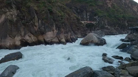 Powerful Rapids Crashing Through Tiger Leaping Gorge – Dramatic Yangtze River Stock Footage 325334585