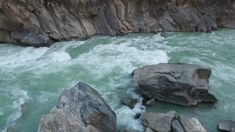 Powerful Rapids Crashing Through Tiger Leaping Gorge – Dramatic Yangtze River Stock Footage 325334619