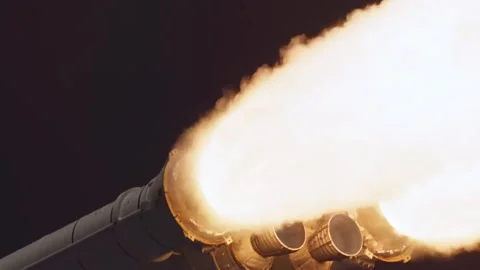 Powerful rocket engine nozzles firing bright plumes of fire and smoke. Stock Footage 333296943