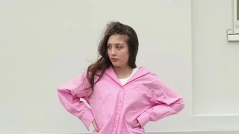 Powerful scene, the woman's expression shifts dramatically, revealing deep anger Stock Footage 287701483