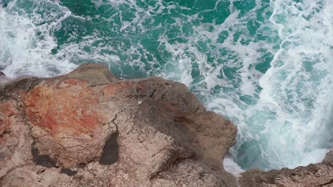 Powerful sea waves break on the rocks. The power of marine nature. Transparen Stock Footage 169667194