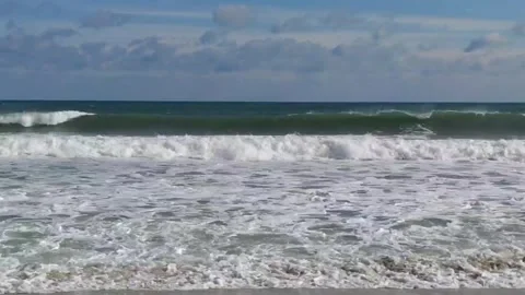 Powerful sea waves breaking on sandy shore Stock Footage 325735144