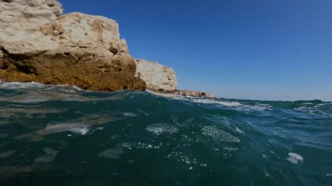 Powerful sea waves crushing into a massive cliff Stock Footage 148514605