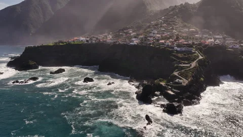 Powerful seaside scene featuring crashing waves and scattered Stock Footage 320741090